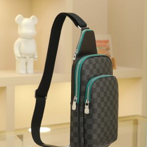 Alternative view of AVENUE Shoulder Bag Crafted from Damier Graphite canvas, the Avenue shoulder bag is the perfect companion for urban living: compact and stylish, it embodies a relaxed, carefree attitude.The "smart" shoulder strap design accommodates carrying on either the left or right shoulder. Its ergonomic shape enhances comfort during wear; a dual-zipper closure ensures valuables remain secure. Dimensions: 20 x 31 x 10cm